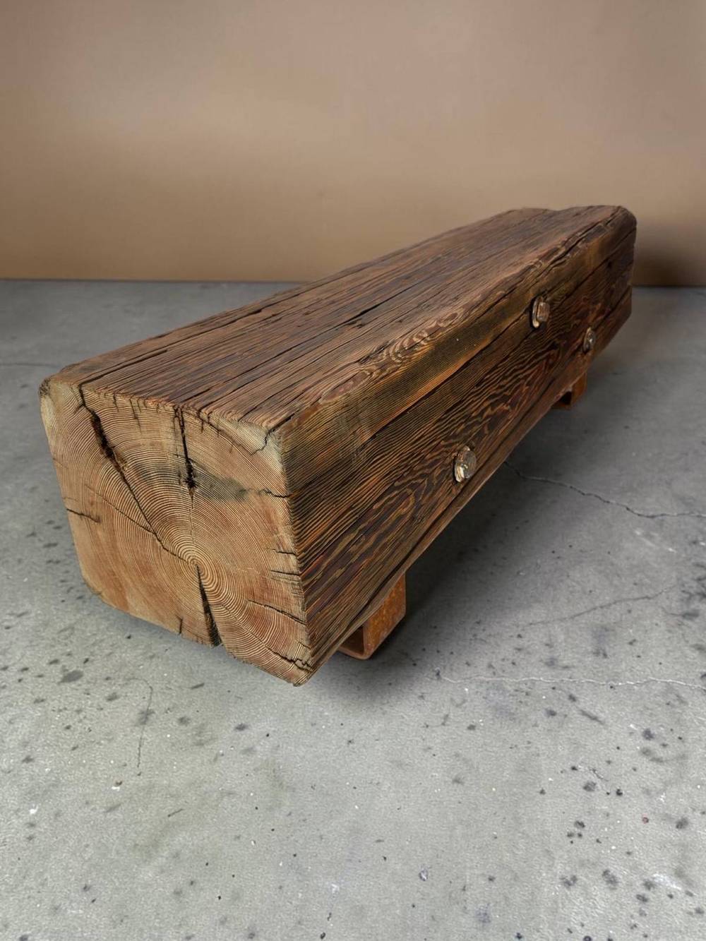 Angled view of the beam bench showing seat thickness