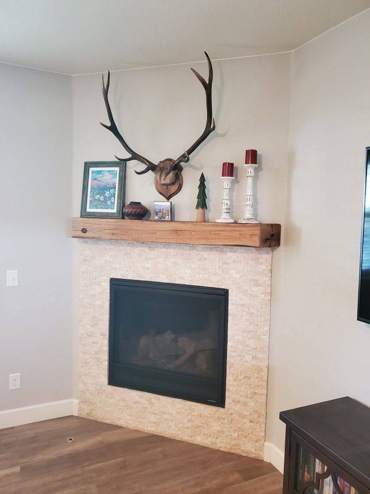 Slim profile reclaimed mantel on a painted surround