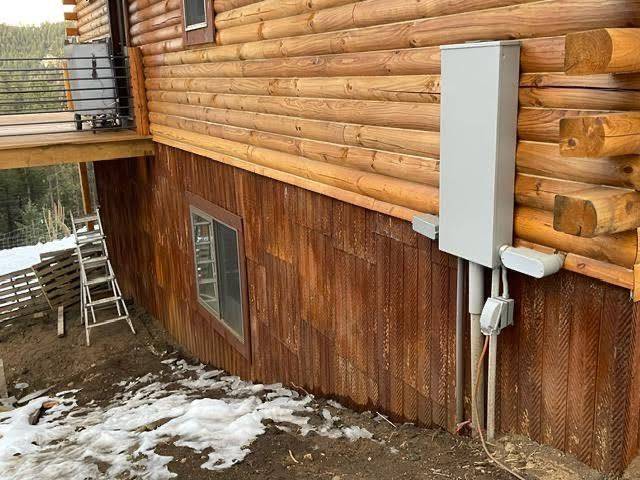 Barnwood used as exterior cabin cladding