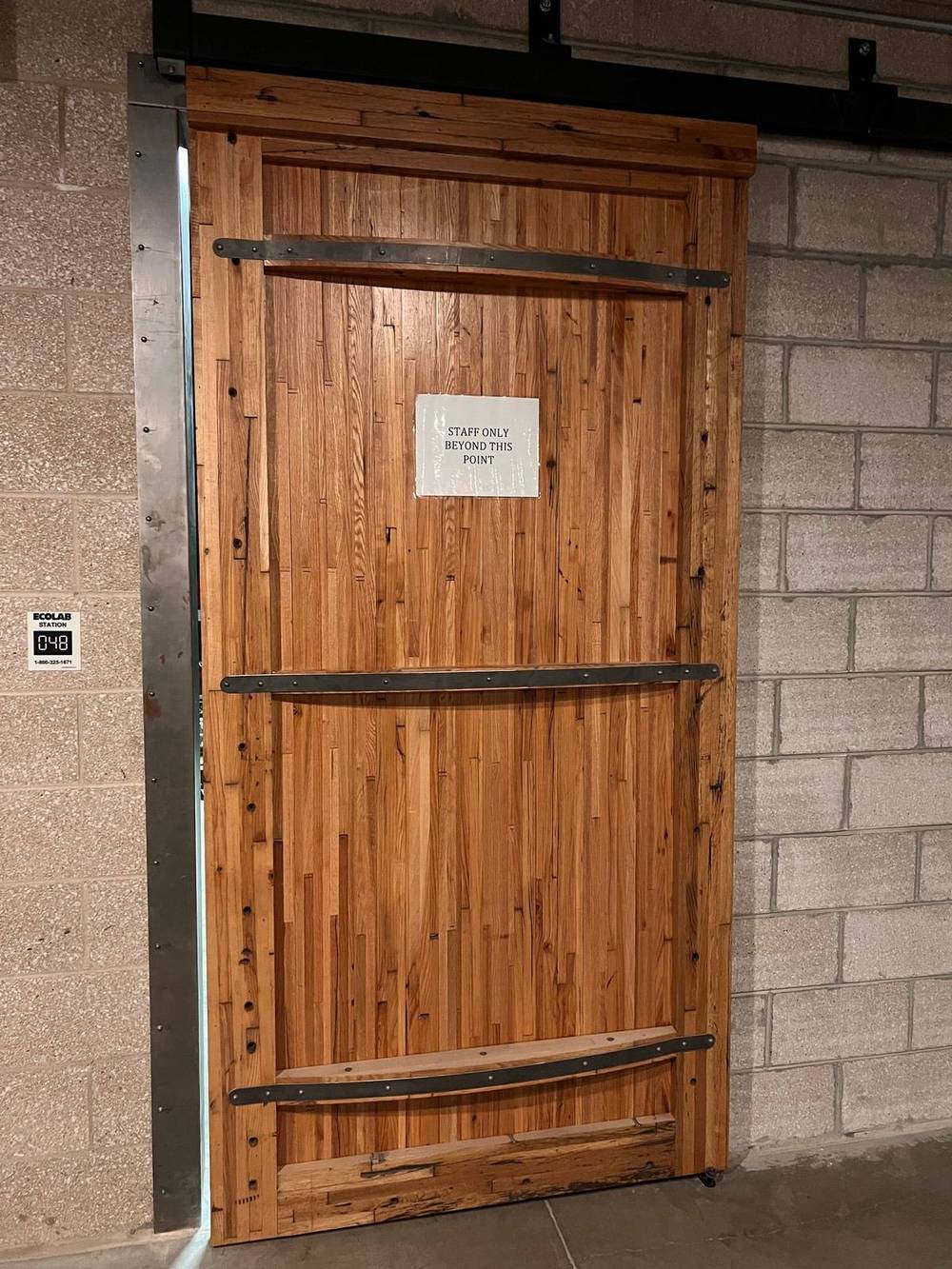 Reclaimed steel and timber used together in an architectural opening