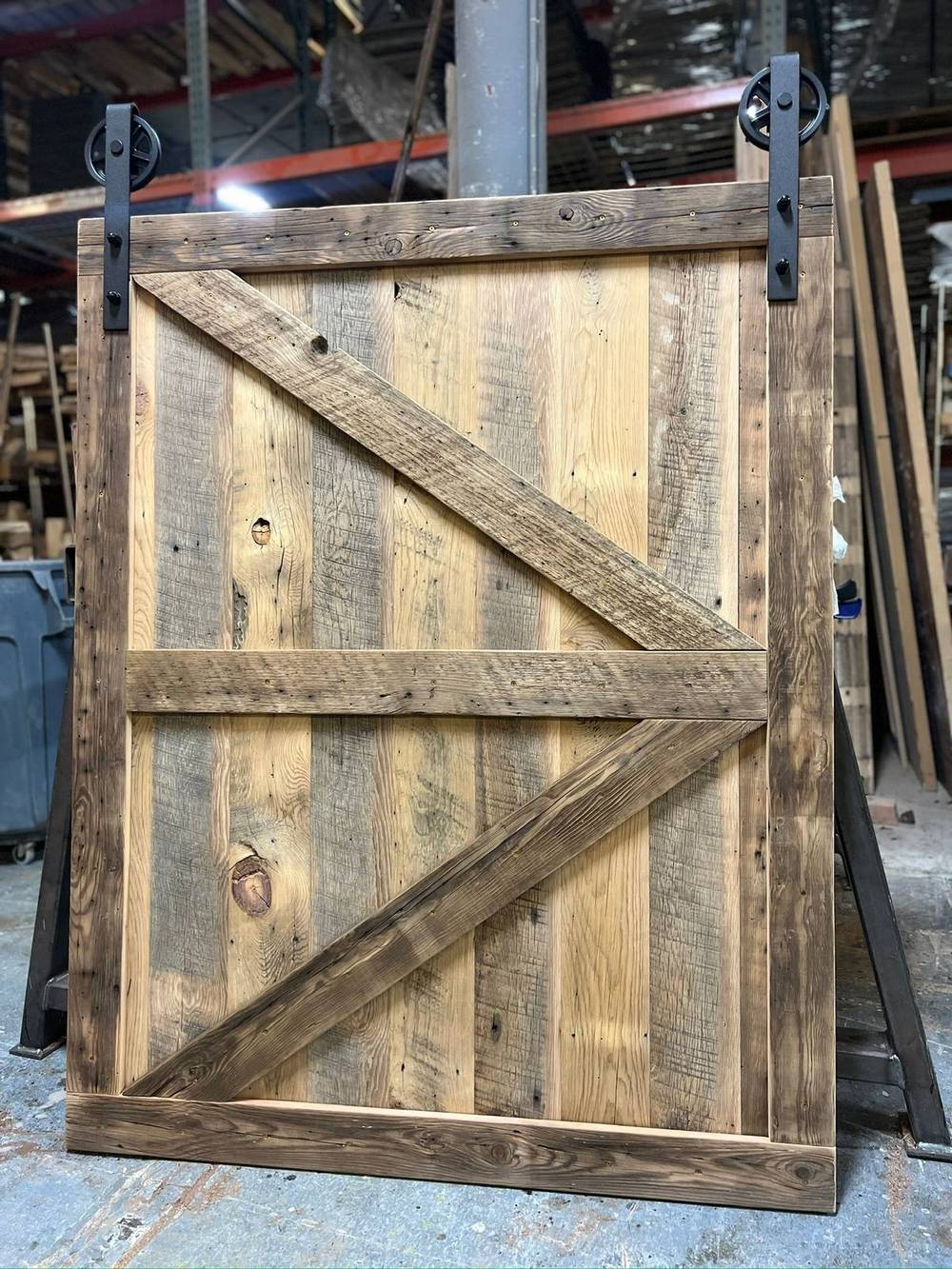 Reclaimed metal and timber detail on a Z-braced door