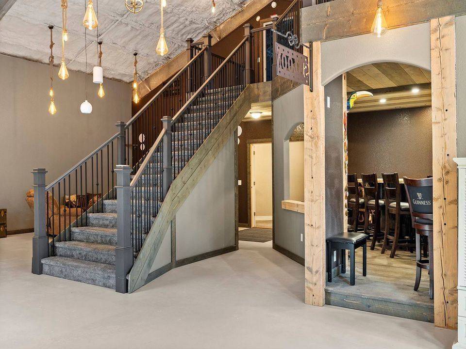 Reclaimed Douglas fir beams framing a stair entry