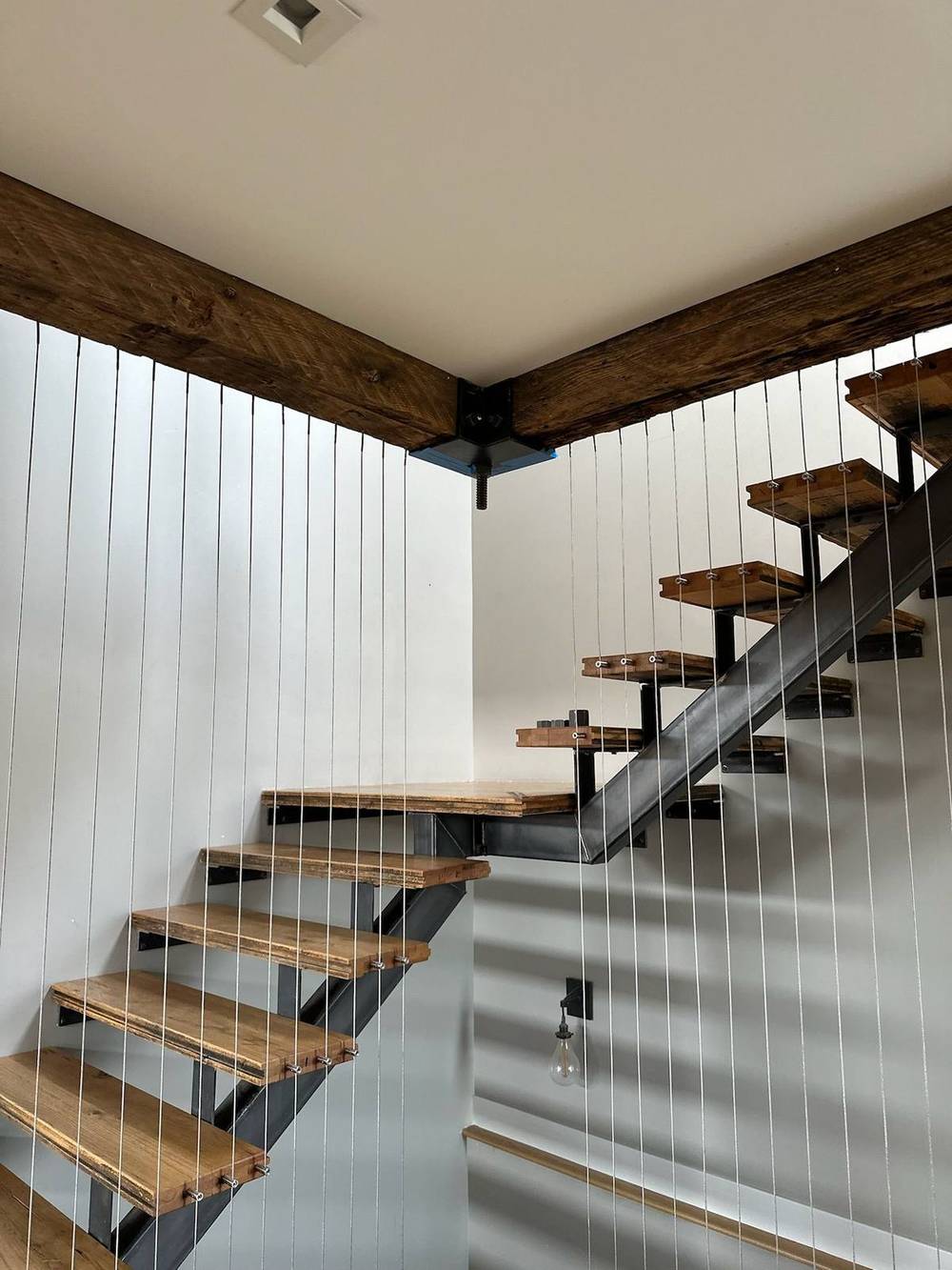 Reclaimed Douglas fir used as floating stair treads